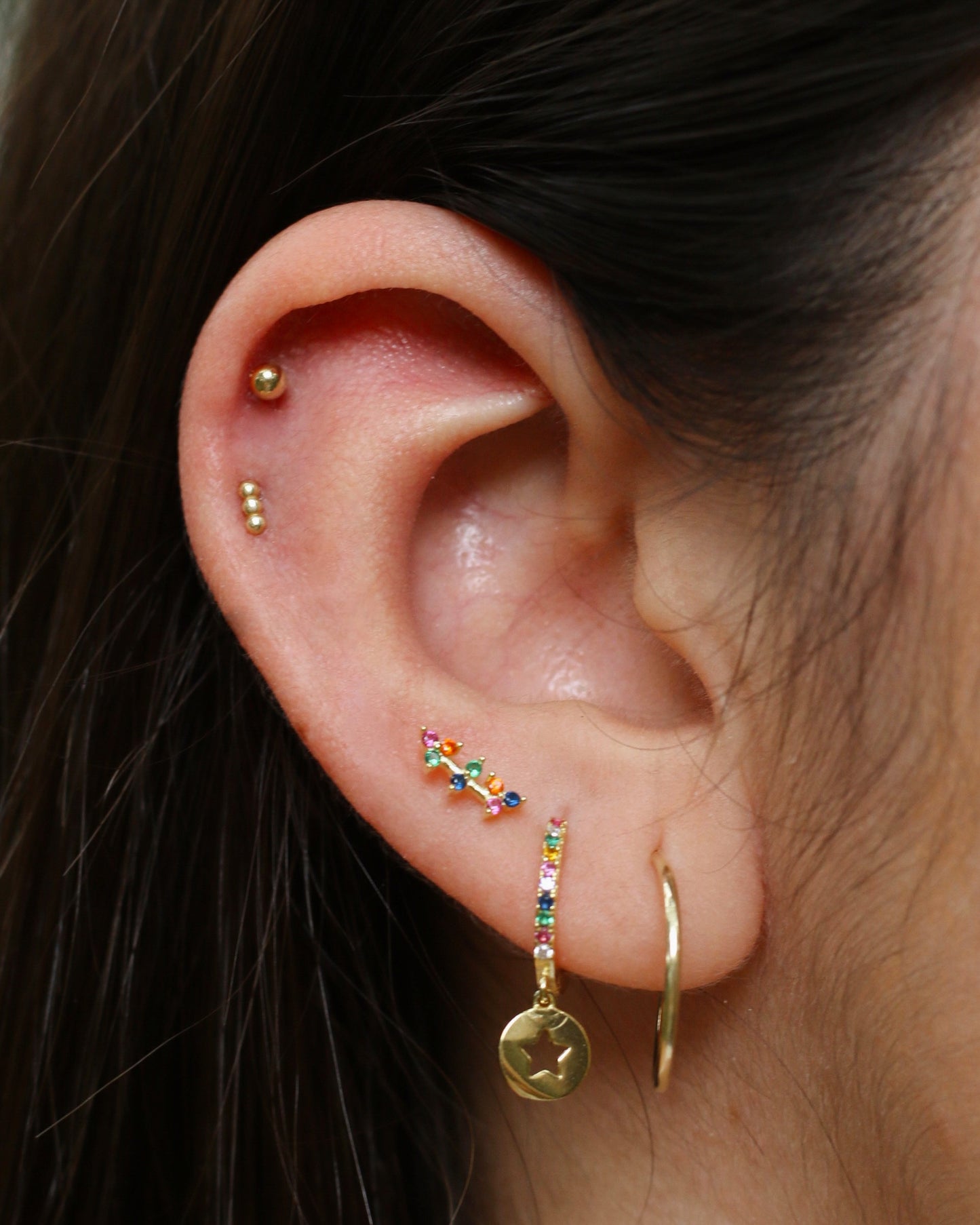 Arracada medalla estrella